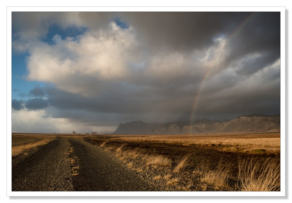 Landscape photograph, Fáskrúðarbakkakirkja, church with rainbow, clouds, Iceland, waiting for the light