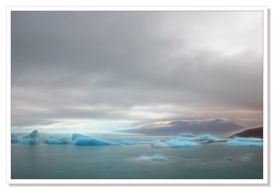 Jökulsárlón, Jokulsarlon, landscape photograph, Icebergs floating in the lagoon beneath the glacier edited with Topaz Glow